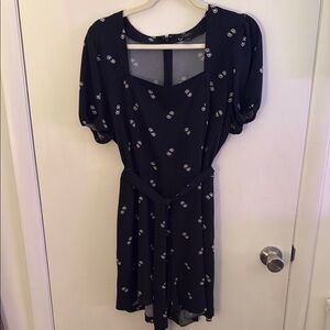 Elegant Black Romper with Patterned Design